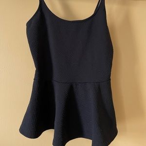 Peplum top with open back